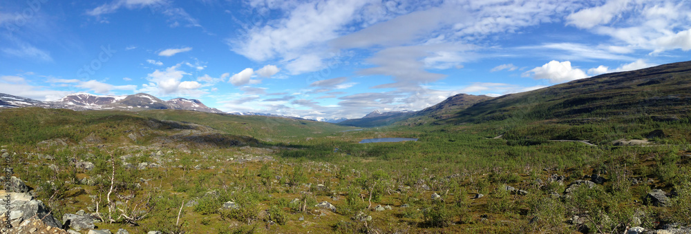 Fototapeta premium Panorama of Norwegian tundra with mountains and lake