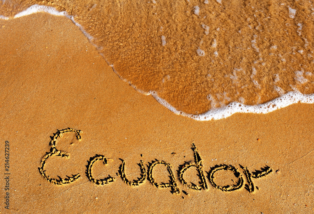 Fototapeta premium Ecuador word on sandy beach background