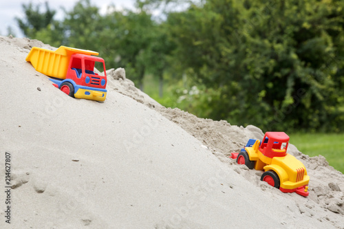  Plastic truck toys in sand