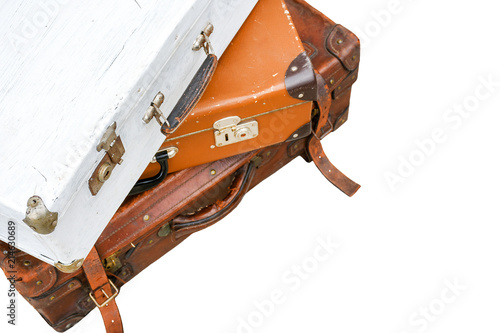 Vintage leather suitcases isolated on white background