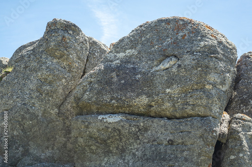 Stones in Bucegi National Park, Carpathian Mountains, Romania, sunny summer day, clear blue sky © Oana