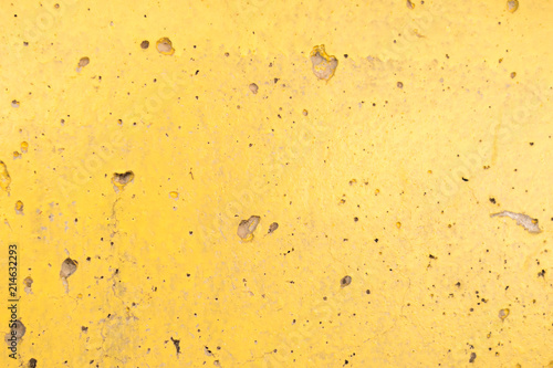 Yellow concrete wall textured background.