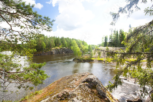 Summer landscape of Kymijoki river waters in Finland.