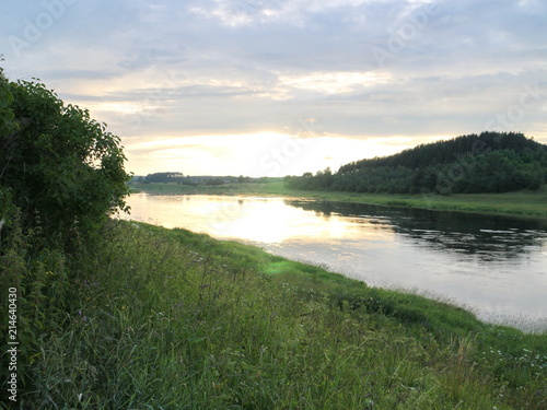 sunset over the river in summer