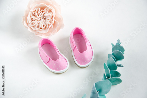 shoes pink and flowers for handmade dolls. Fashion Concept photo