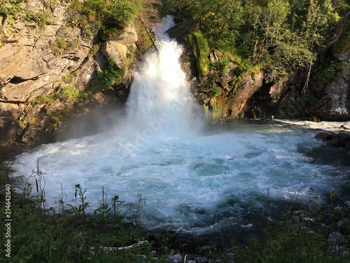 Waterfall Dynamitfossen in Geiranger village, Norway