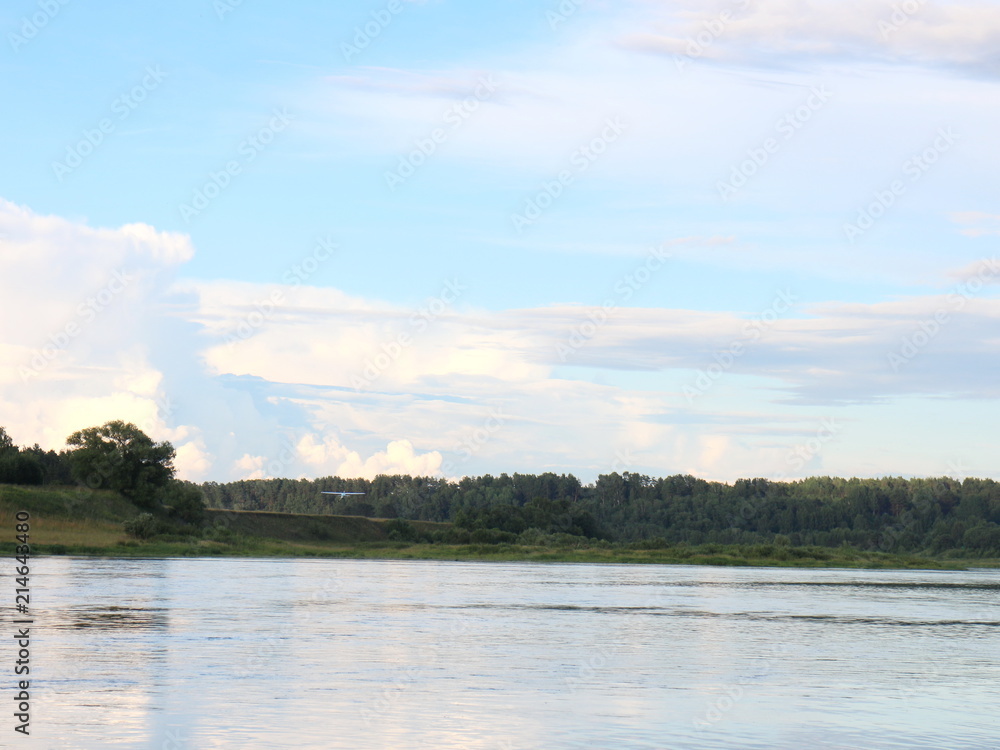 fishing in the river on a summer day