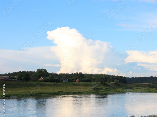 picturesque banks of the river in the summer evening © Andrey