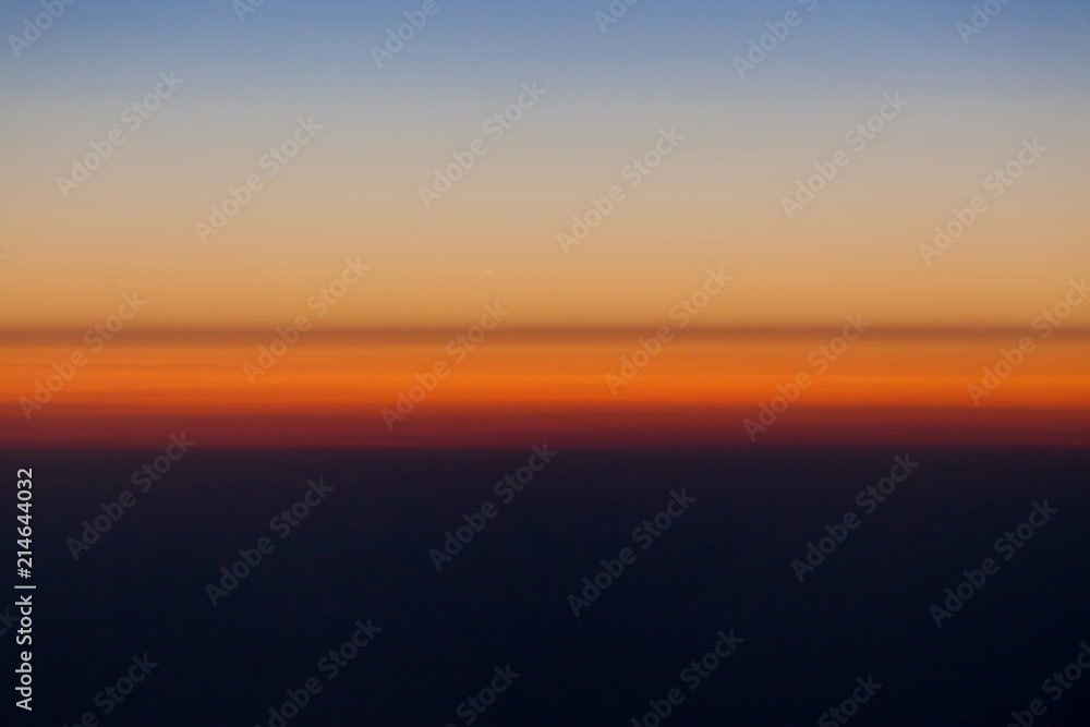 Dusk horizon sky viewed from airplane