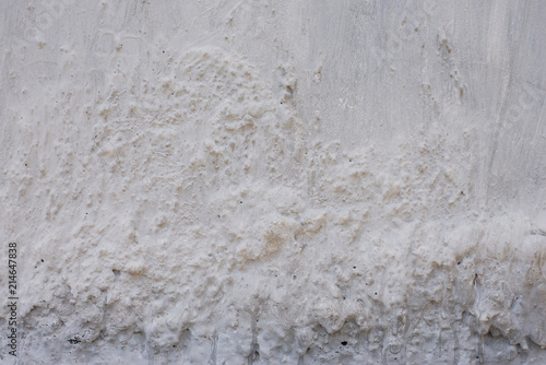 White concrete wall texture and uneven surface.