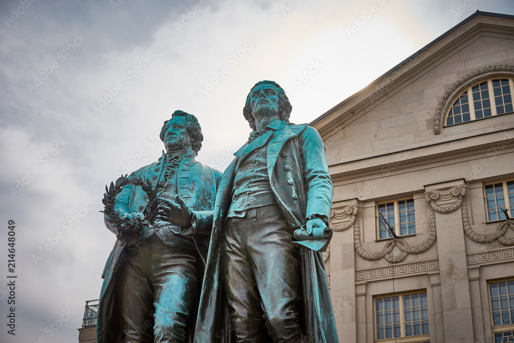 Famous sculpture of Goethe and Schiller in the city of Weimar in Germany / Most famous classical german authors / 18th century Famous sculpture of Goethe and Schiller in the city of Weimar in Germany / Most famous classical german authors / 18th century