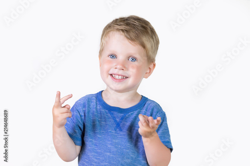 Portrait of cheerful kid boy showing how old he on fingers - isolated over white background