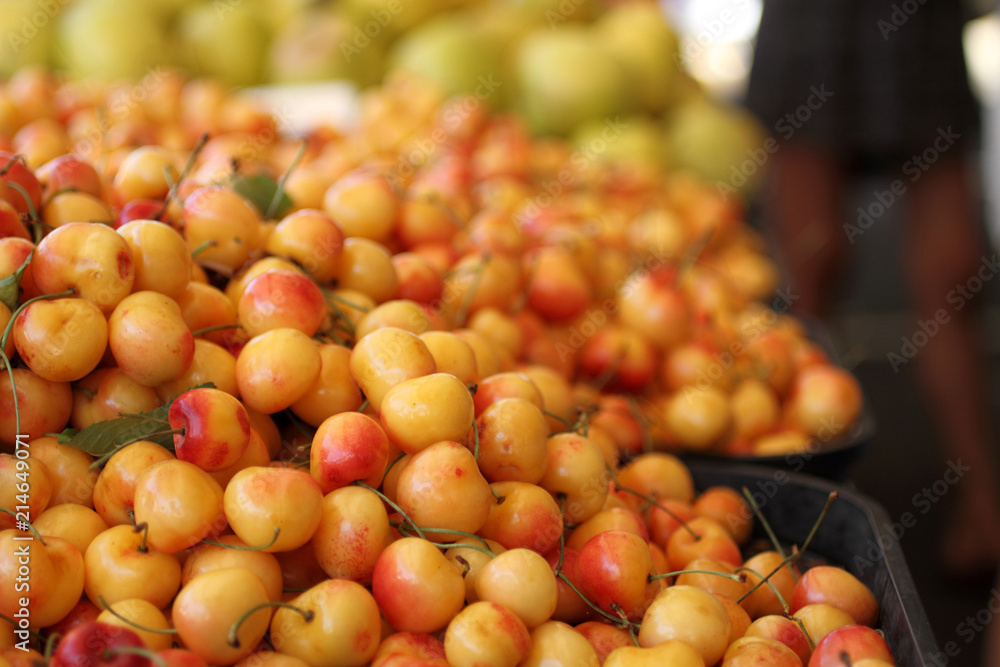 Fresh sweet cherries known as Ranier cherries at a farmer's market. Fresh sweet cherries known as Ranier cherries at a farmer's market.