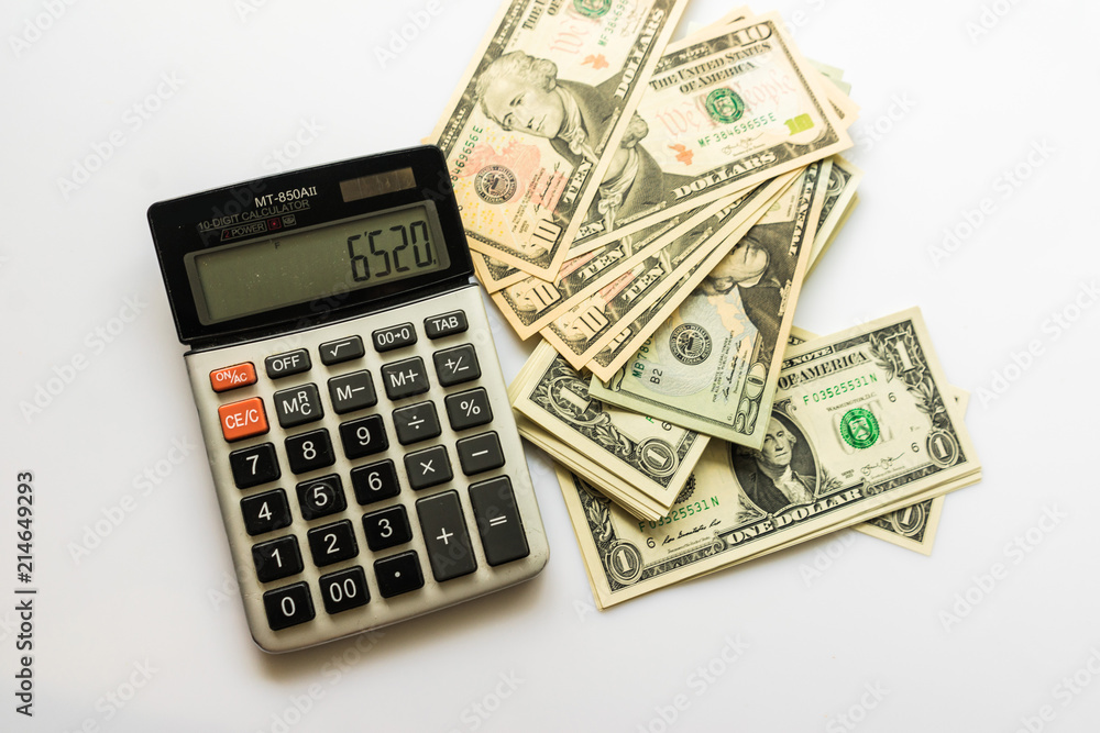 Close-up Money and Calculator, American Dollar Banknotes Close-up Money and Calculator, American Dollar Banknotes