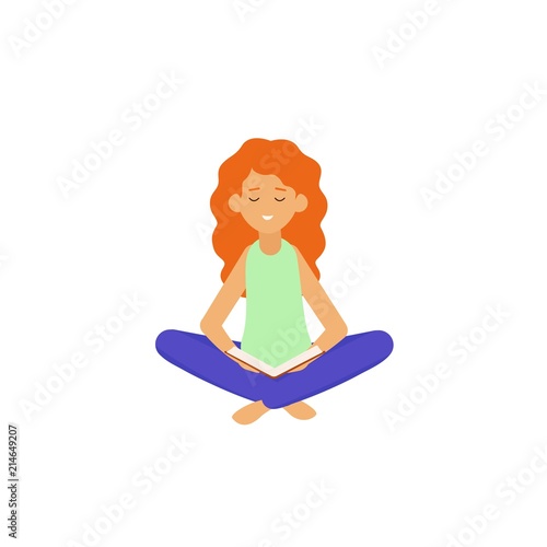 A young woman sitting and reading a book. The girl is holding a book on her knees.
