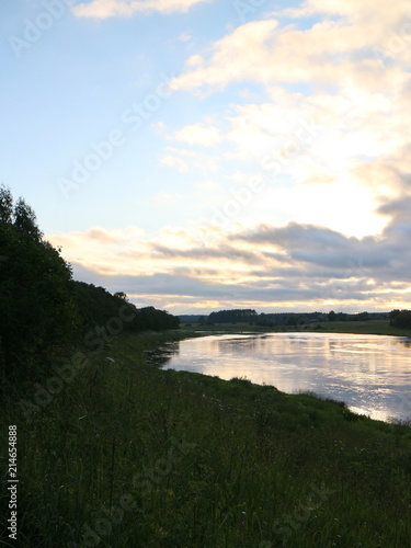 sunset over the river in summer