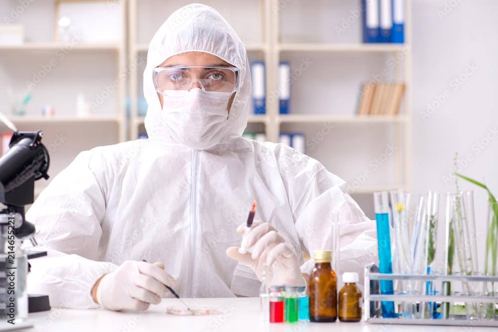 Biotechnology scientist chemist working in lab Biotechnology scientist chemist working in lab