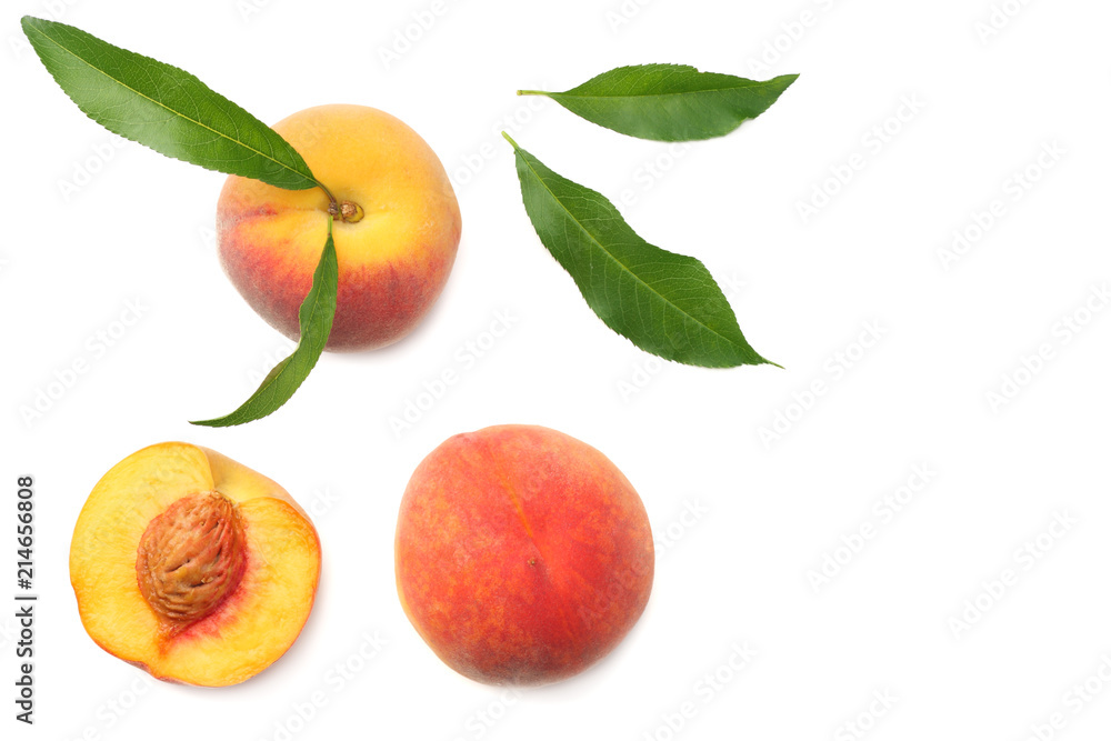 peach fruit with green leaf and slices isolated on white background. top view peach fruit with green leaf and slices isolated on white background. top view