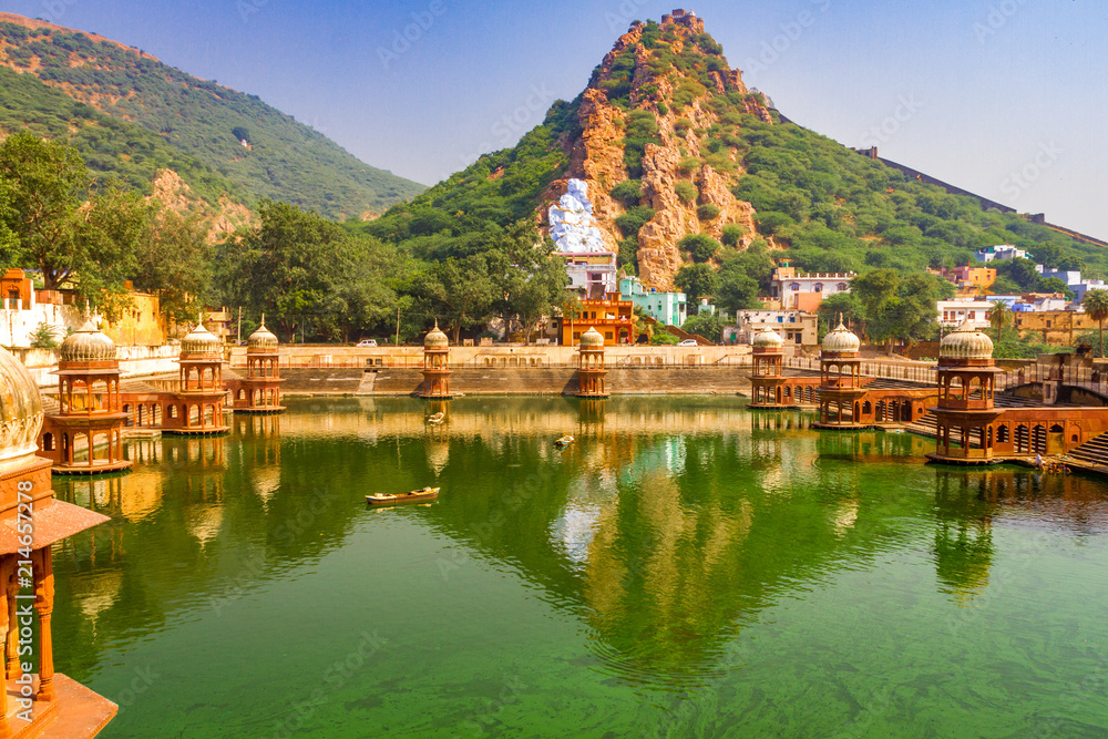 Green lake next to Alwar City Palace with a view of the mountains and Bachelor fortress