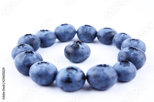 Blueberries on white background, blueberry berries isolated, blue berries close-up, blank for designer, vegetarian food for breakfast, blue fruits for smoothies