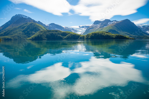 Panorama view on Nordfjorden and Svartisen glacier at Meloy in Norway photo