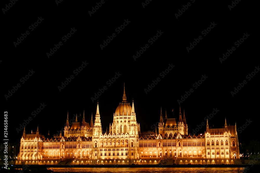 amazing night view of parliament building and river and city lights  in Budapest city, travel concept, space for text