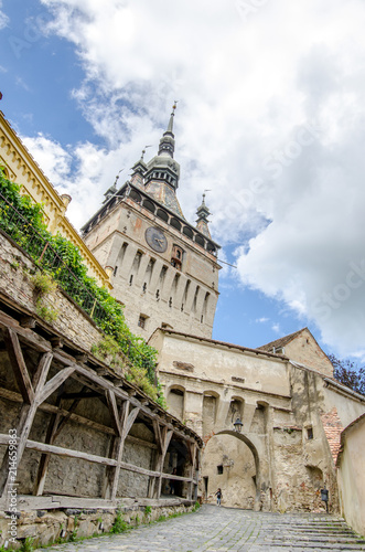 Sighisoara Clock Tower view on a sunny summer day with beautiful colors from this UNESCO World Heritage site photo