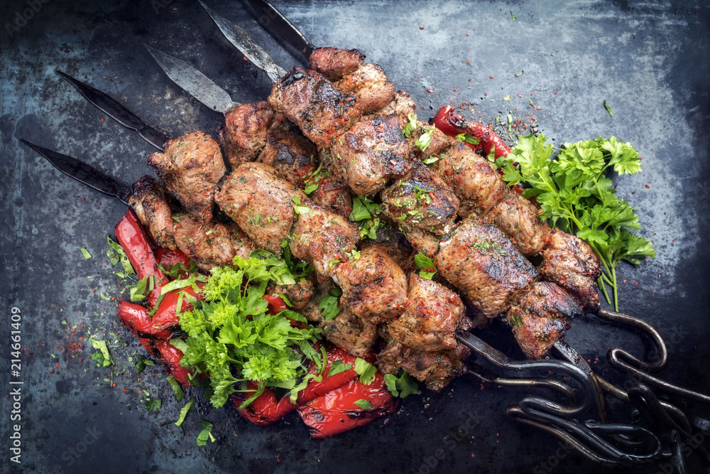Ταπετσαρία Traditional Russian shashlik on a barbecue skewer with paprika as closeup on an