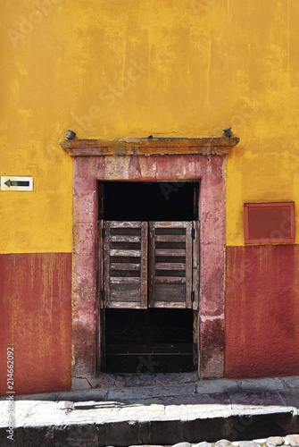 Front entrance of an old mexican cantina, bar pub in San Miguel de Allende Mexico.	