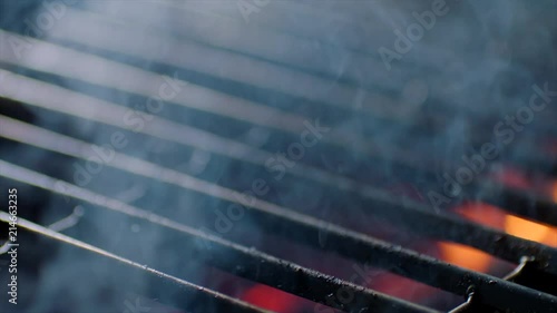Close up of grill ready with fire flames, slow motion