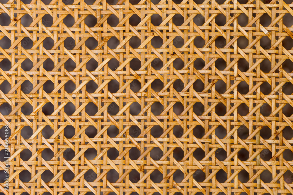 Close up of the pattern formed by open weave rattan cane - obrazy, fototapety, plakaty 