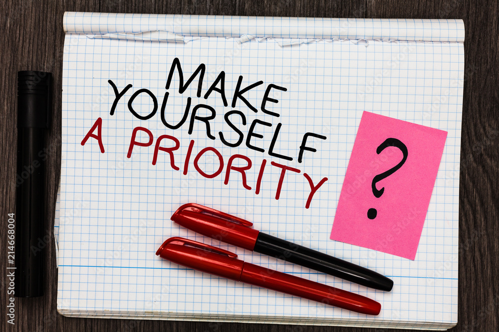 Word writing text Make Yourself A Priority. Business concept for Think in your own good first personal development Color pen on written notepad with question mark black marker on woody deck. Word writing text Make Yourself A Priority. Business concept for Think in your own good first personal development Color pen on written notepad with question mark black marker on woody deck.