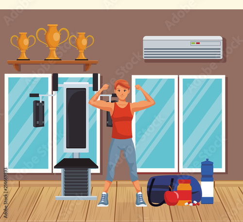 Young and fitness man wit strong arms at gym vector illustration graphic design