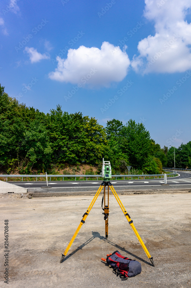 Surveyor, total positioning station on the site Surveyor, total positioning station on the site