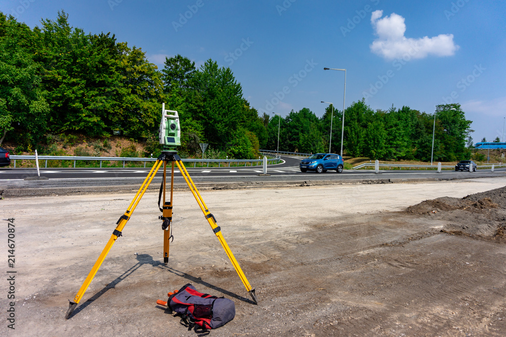 Surveyor, total positioning station on the site Surveyor, total positioning station on the site