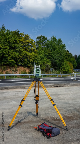 Surveyor, total positioning station on the site