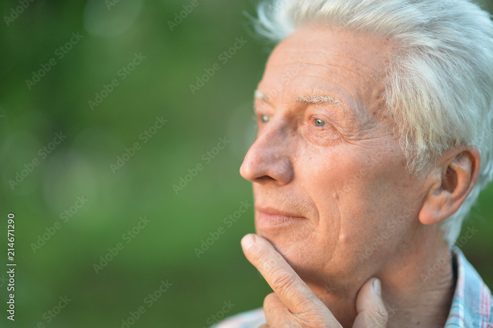 portrait of thoughtful senior man portrait of thoughtful senior man