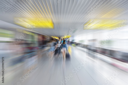 Abstract motion blur airport terminal with passenger for background © Drpixel