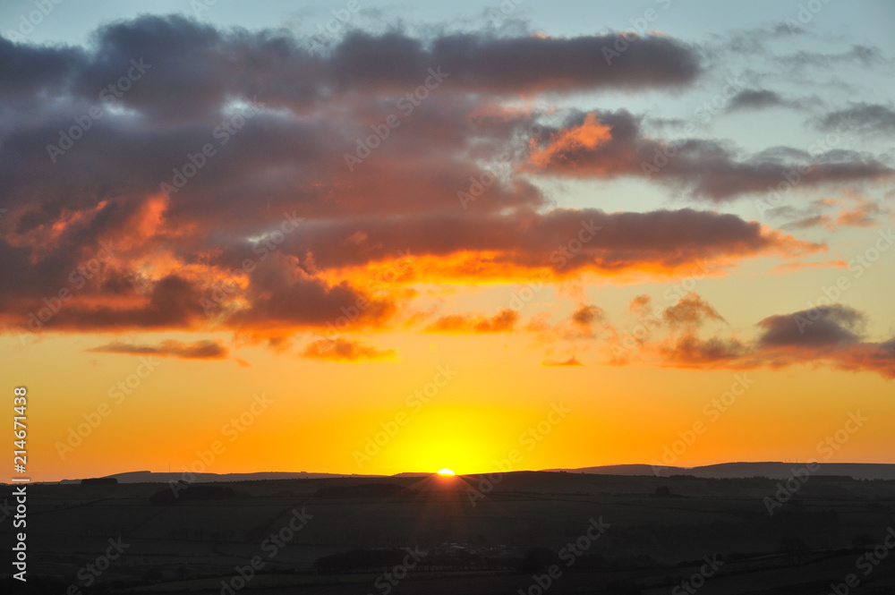 Beautiful sunrise with glowing clouds