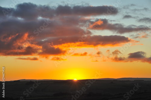 Beautiful sunrise with glowing clouds