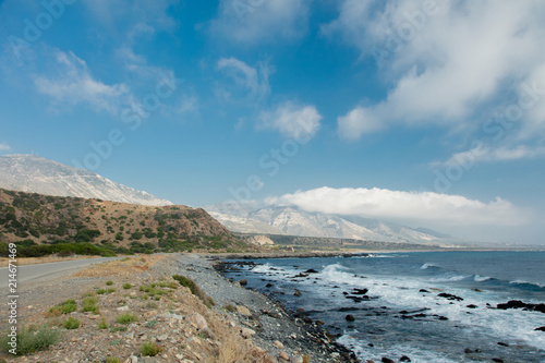 Sea coast with view on mountains on the beach of Crete, Greece
