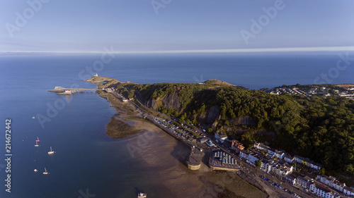 Editorial Swansea, UK - July 22, 2018: Aerial view of the Mumbles in Swansea, featuring the slipway, knab rock, the pier and lighthouse