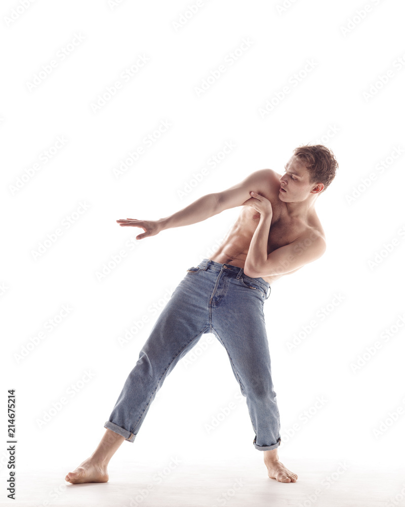 Young beautiful dancer is posing in studio Young beautiful dancer is posing in studio