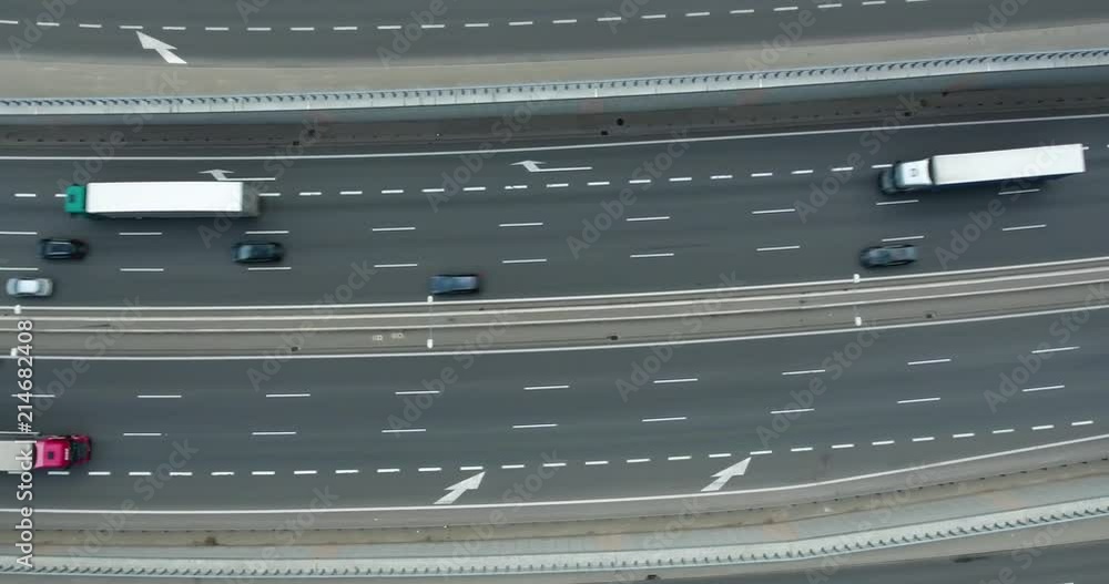 Aerial Overhead View Of Cargo Driving On Highway Aerial Overhead View Of Cargo Driving On Highway