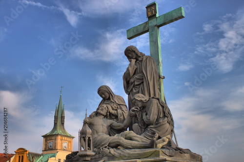 The Pieta on Charles Bridge in Prague, Czech Republic photo