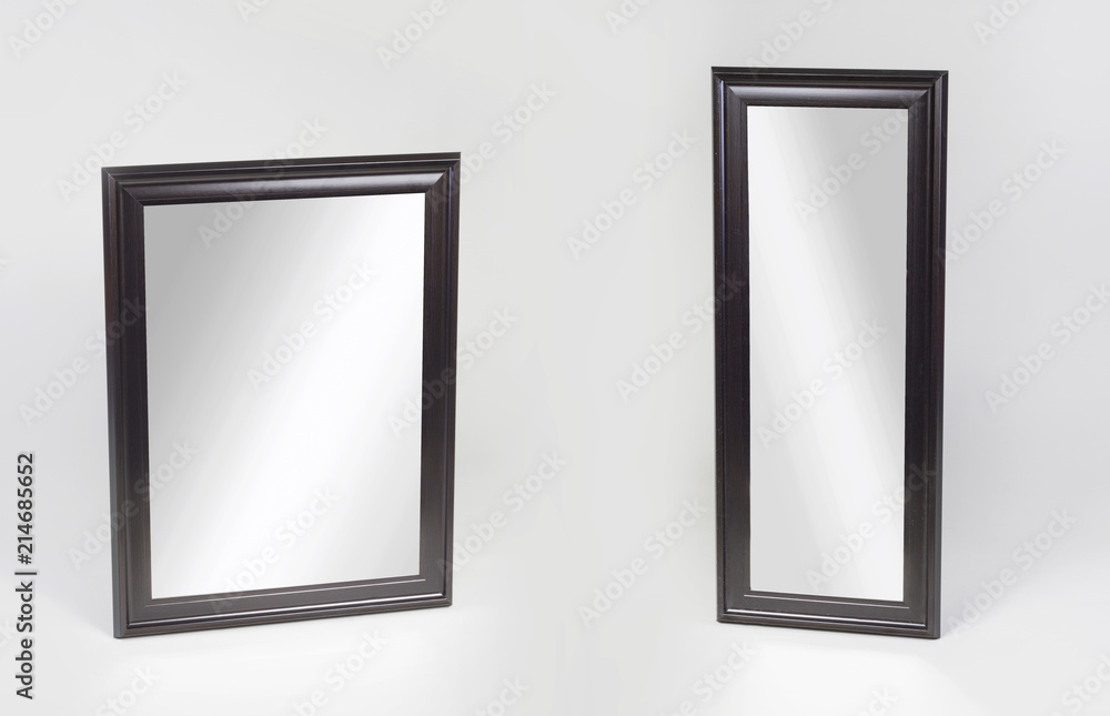 Large and small black framed mirrors isolated on white background Large and small black framed mirrors isolated on white background