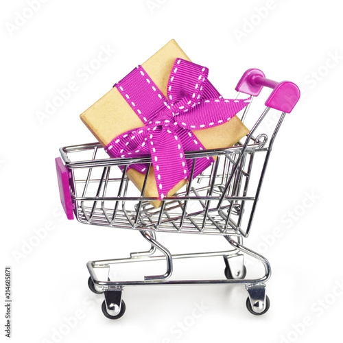 Gift in a shopping cart isolated on white background