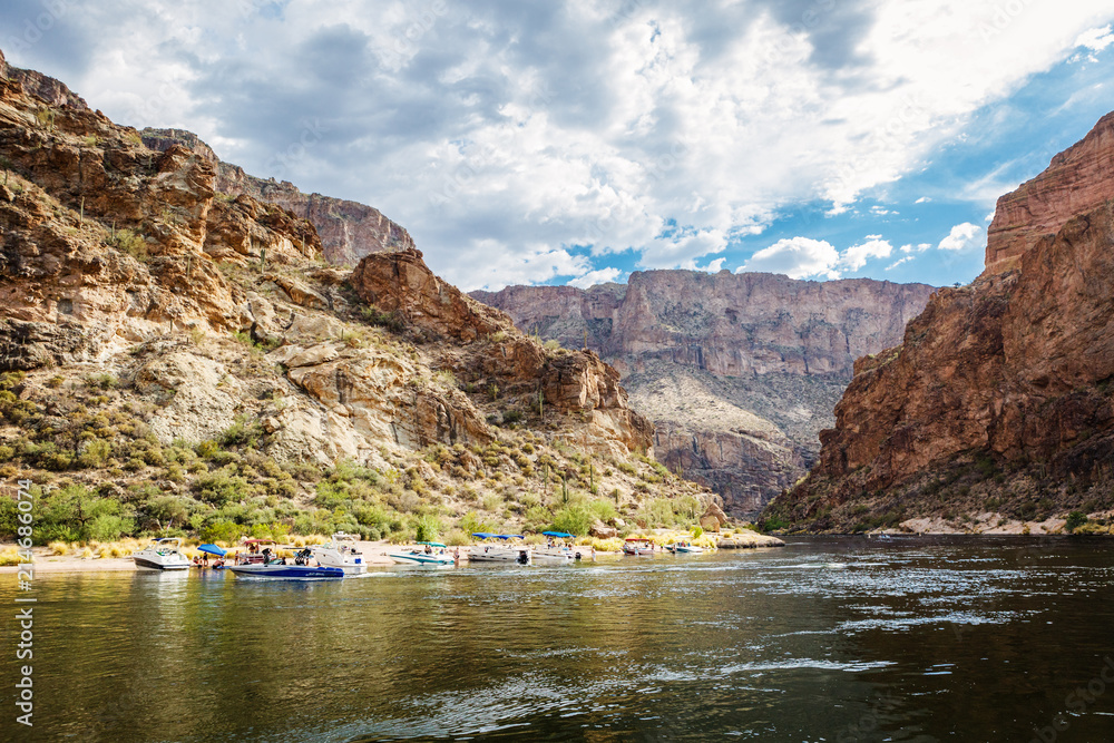 Fototapeta premium Party Boats Docked on Shore at Canyon Lake Arizona