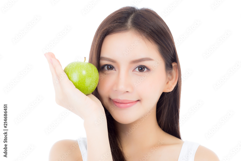 Beautiful of portrait young asian woman smile and holding green apple fruit, girl with wellness and healthy isolated on white background. Beautiful of portrait young asian woman smile and holding green apple fruit, girl with wellness and healthy isolated on white background.