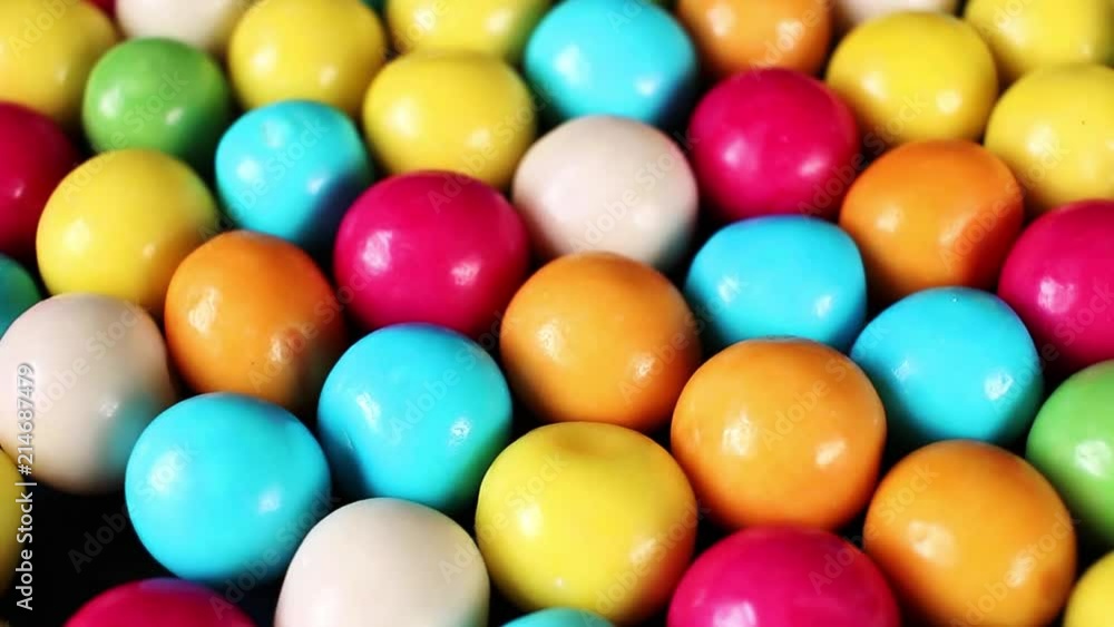 Retro round bubble gum video rotating food closeup background. Colorful texture. Retro round bubble gum video rotating food closeup background. Colorful texture.
